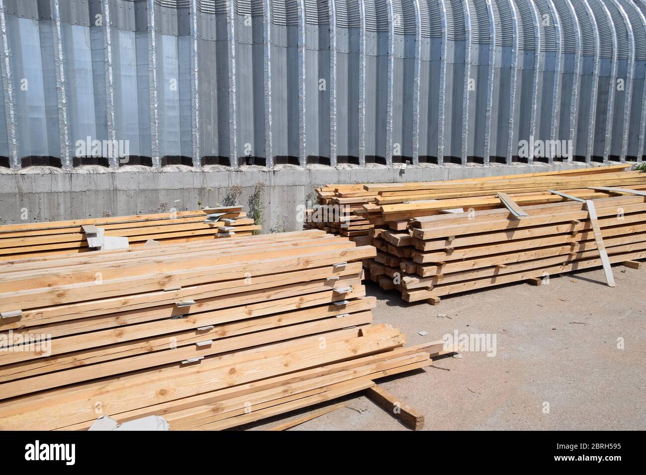 The boards are built to be stored at the construction site. Boards for construction Stock Photo