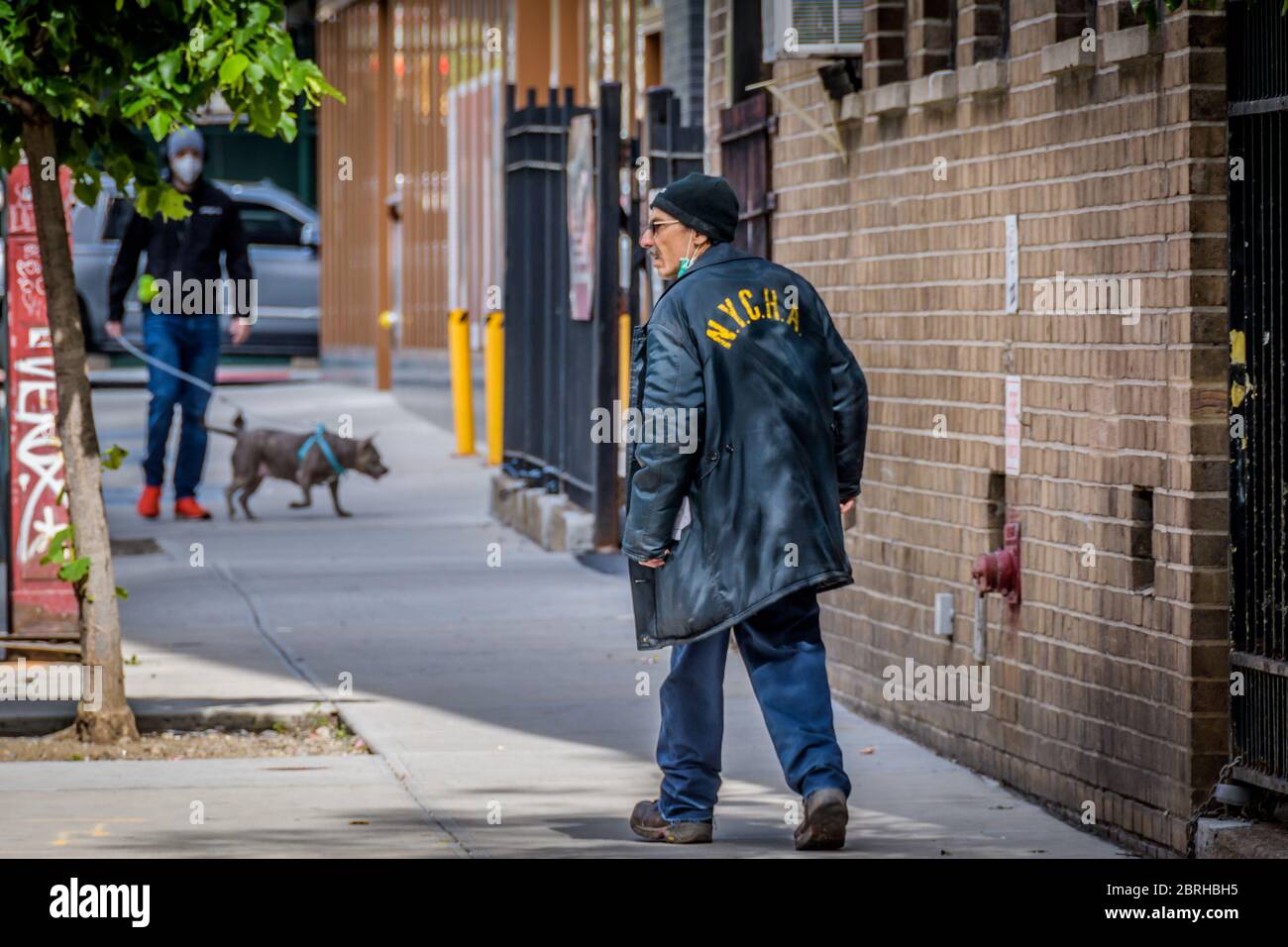 A NYCHA worker seen at Bushwick Houses housing project in Brooklyn. The