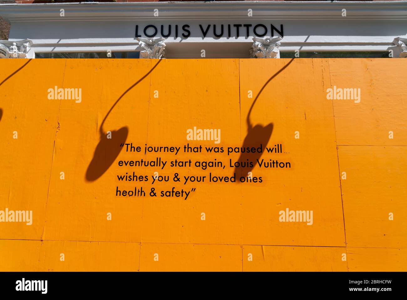COVID-19 Affects to New York Business. Hopeful messages on the barricade  board at storefront of Louis Vuitton SOHO store in the Saturday afternoon  Stock Photo - Alamy