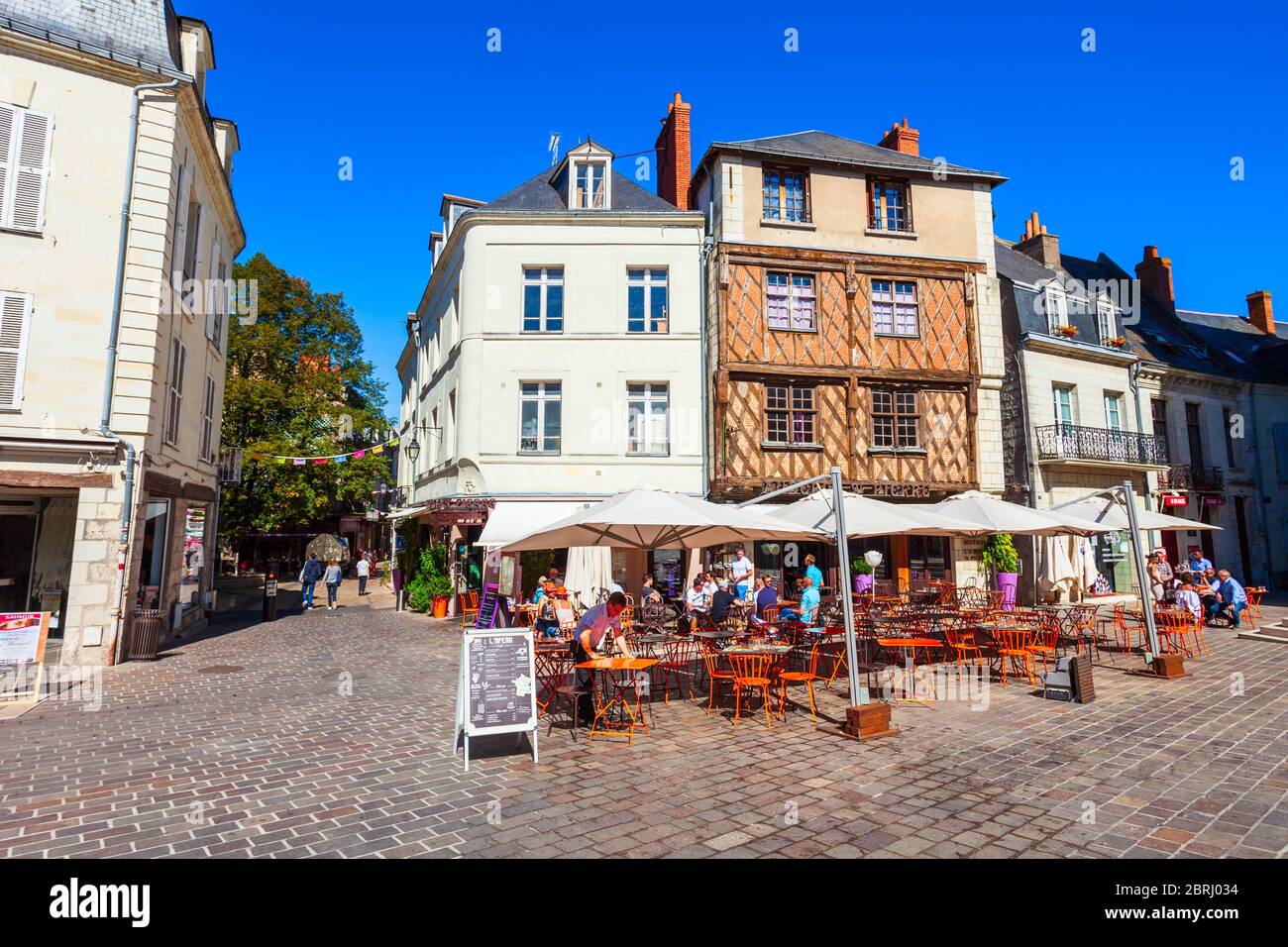 SAUMUR, FRANCE - SEPTEMBER 15, 2018: Street cafe at Saint Pierre square in Saumur city, Loire valley in France Stock Photo