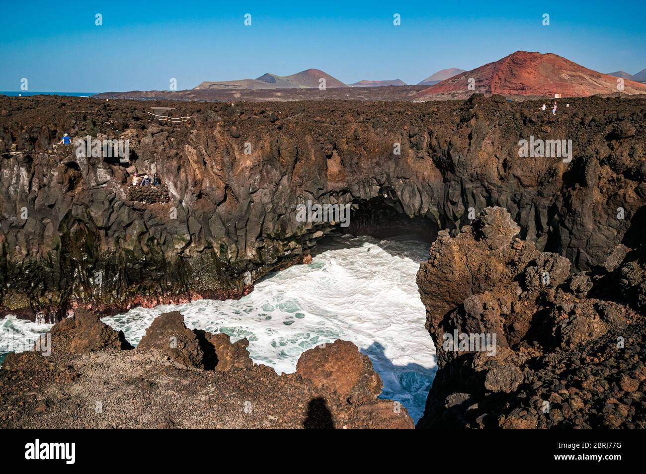 Close-up on the popular tourist attraction on Lanzarote, 'Los Hervideros', the curiously-shaped cliffs and underwater caves formed by lava solidificat Stock Photo