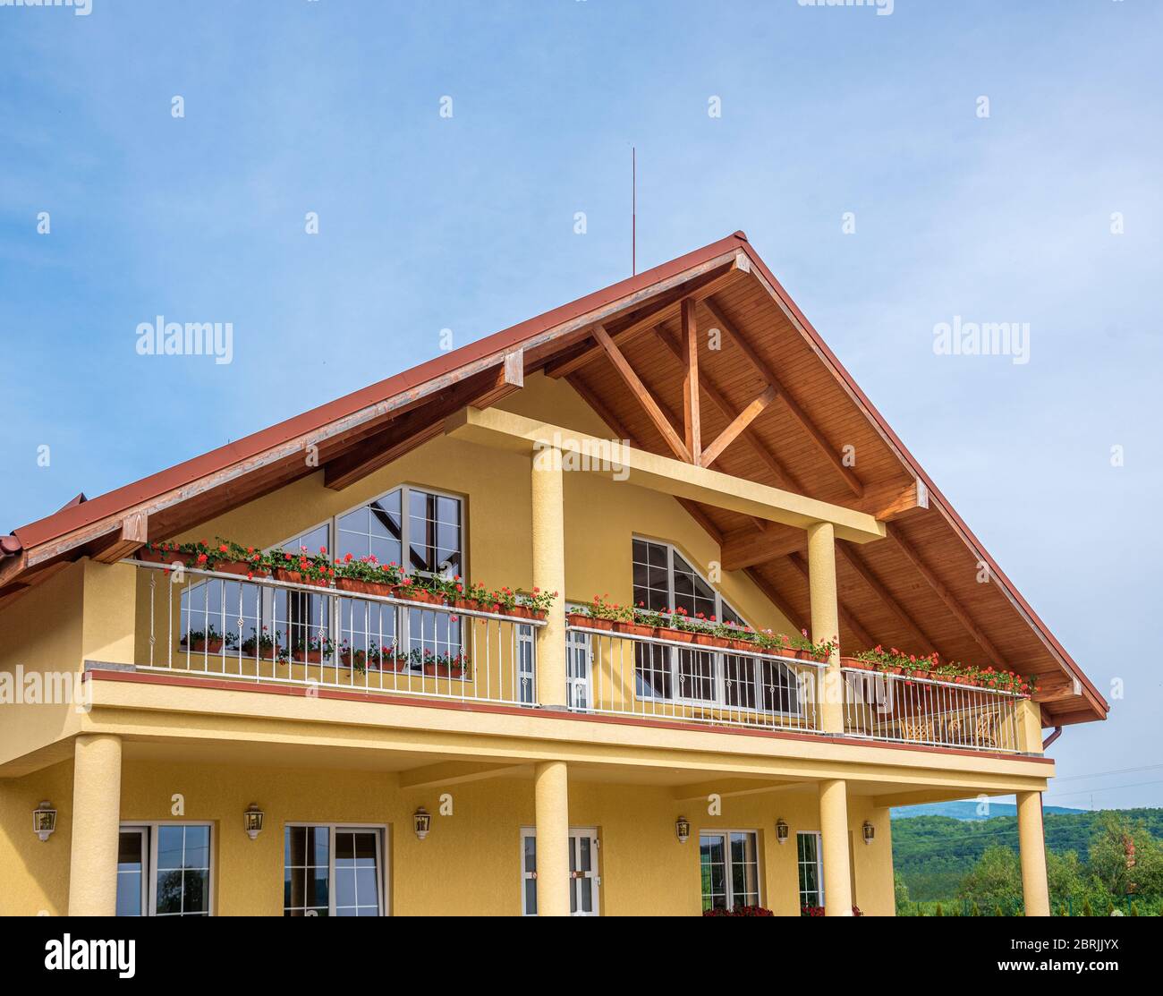 Cottage balcony with flowers Stock Photo