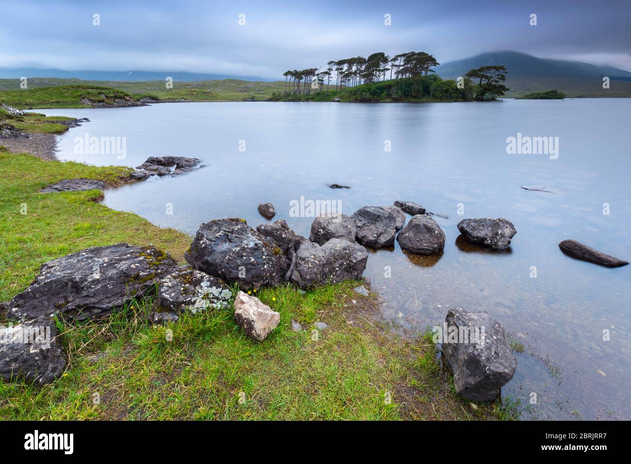 View of Pine Island on the Derryclare Lough. Pine Island, Connemara National Park, County Galway, Connacht province, Inagh Valley, Ireland. Stock Photo