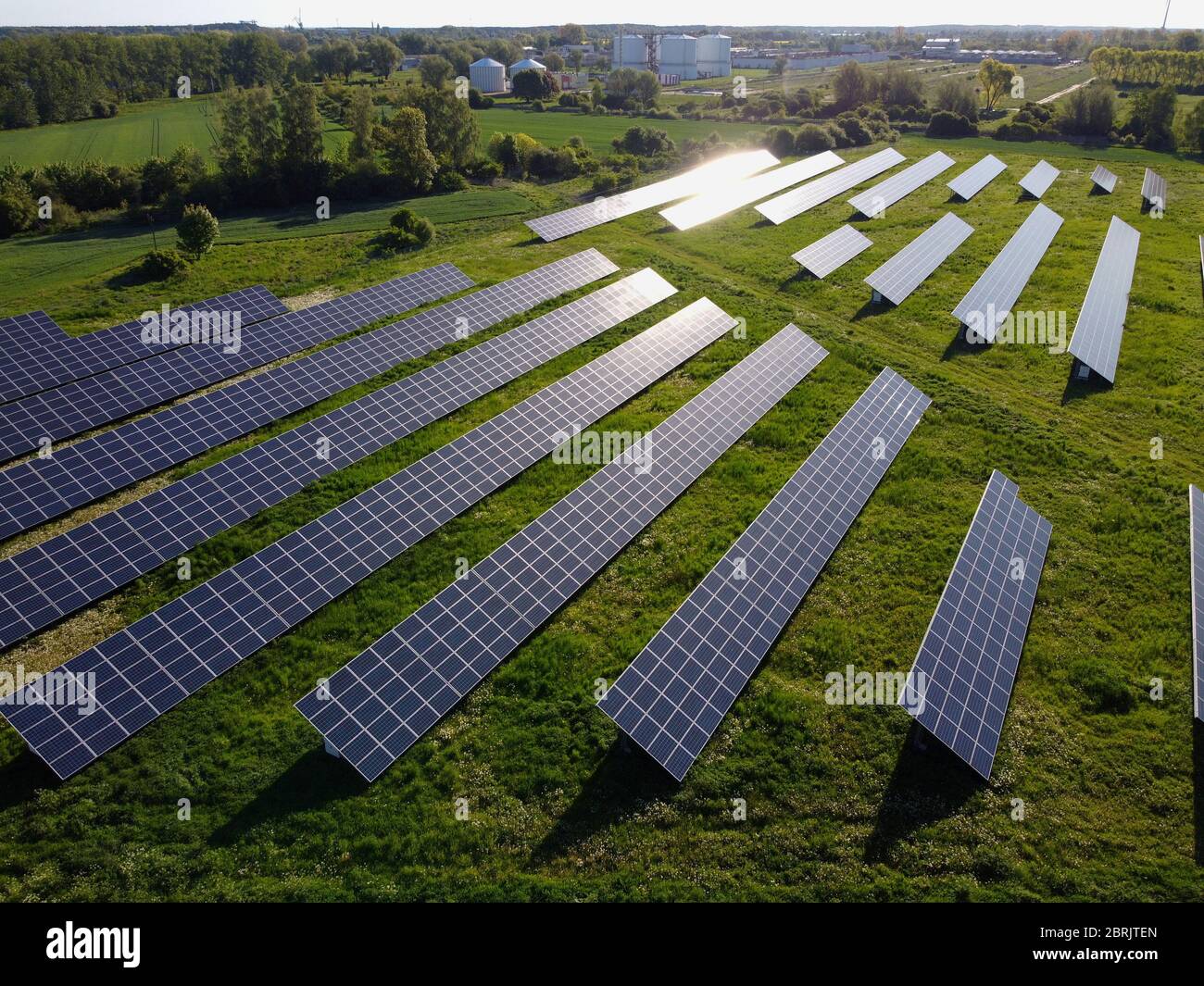 Sun reflection in solar panels, photovoltaic power plant Stock Photo