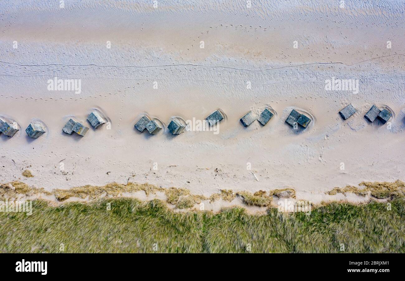 Aerial view of concrete anti tank second world war coastal defences on beach at Dumbarnie in Fife, Scotland, Uk Stock Photo