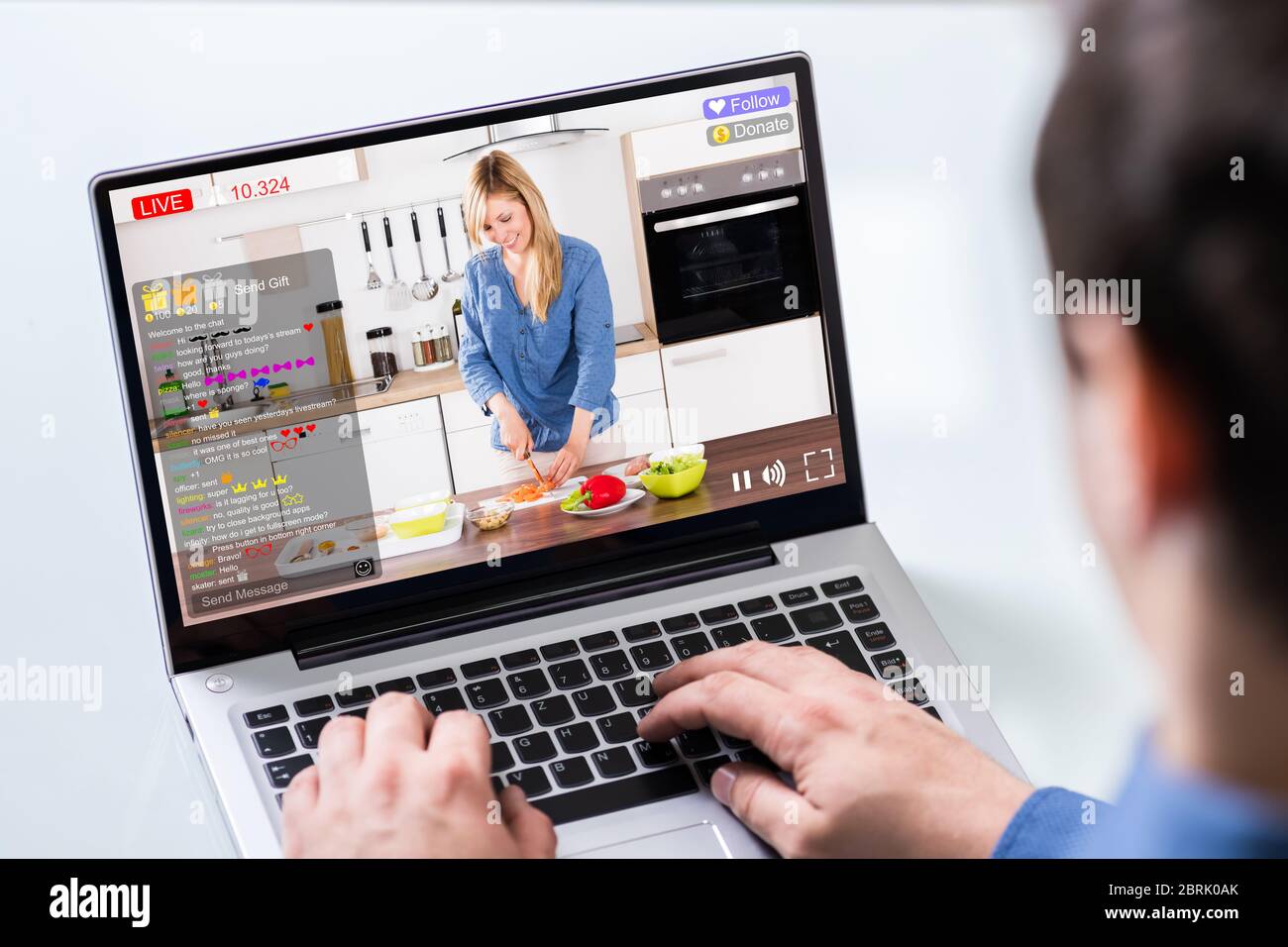Streaming Live Cooking Internet Show On Laptop Stock Photo