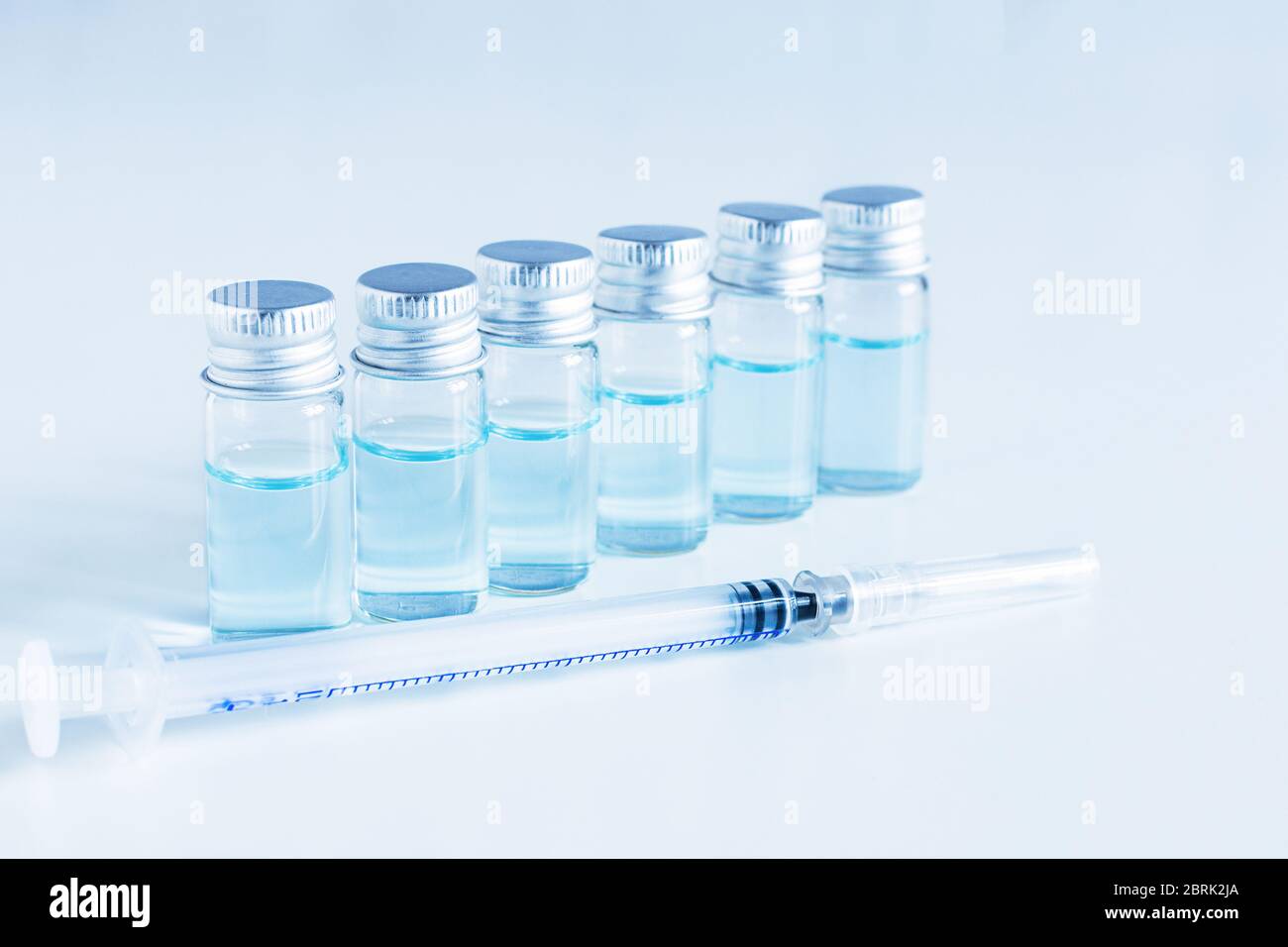 Medical glass vials and syringe for vaccination. Ampules for injection ...