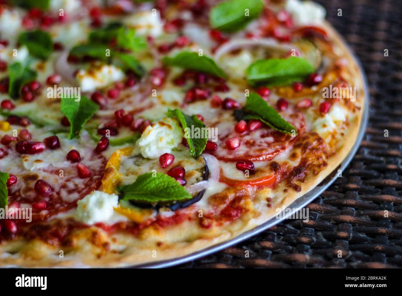 Lebanese pizza with pomegranate Stock Photo