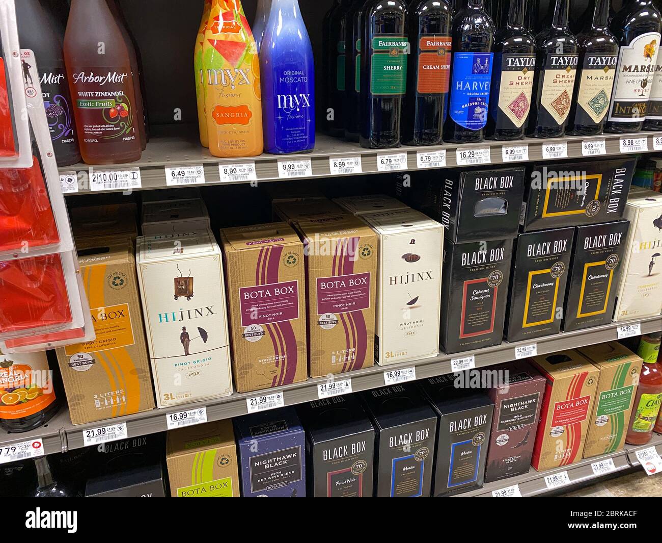 Shelves wine liqour bottles shop interior hires stock photography and