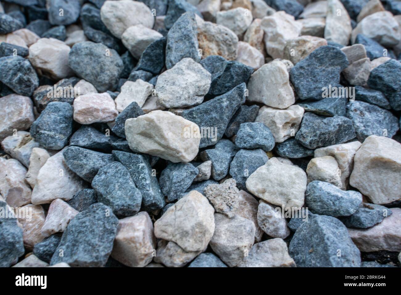 Stone background. blue gravel. Granite texture. The rocky road. Fine pebbles. Construction material. The texture of the stones. Wallpaper with fine gr Stock Photo - Alamy Stone background. blue gravel. Granite texture. The rocky road. Fine pebbles. Construction material. The texture of the stones. Wallpaper with fine gr Stock Photo - Alamy