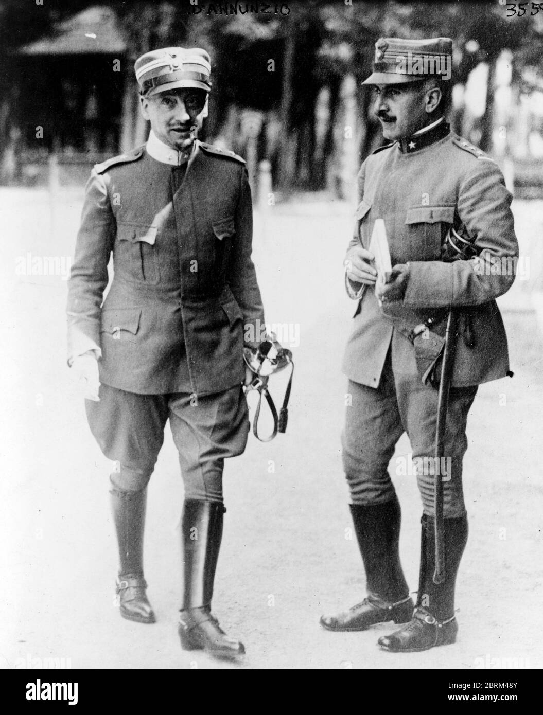Gabriele D'Annunzio, facing slightly right, with another officer. General Gabriele D'Annunzio, Prince of Montenevoso (1863 – 1938), Italian poet, playwright, and journalist and soldier during World War I. Stock Photo