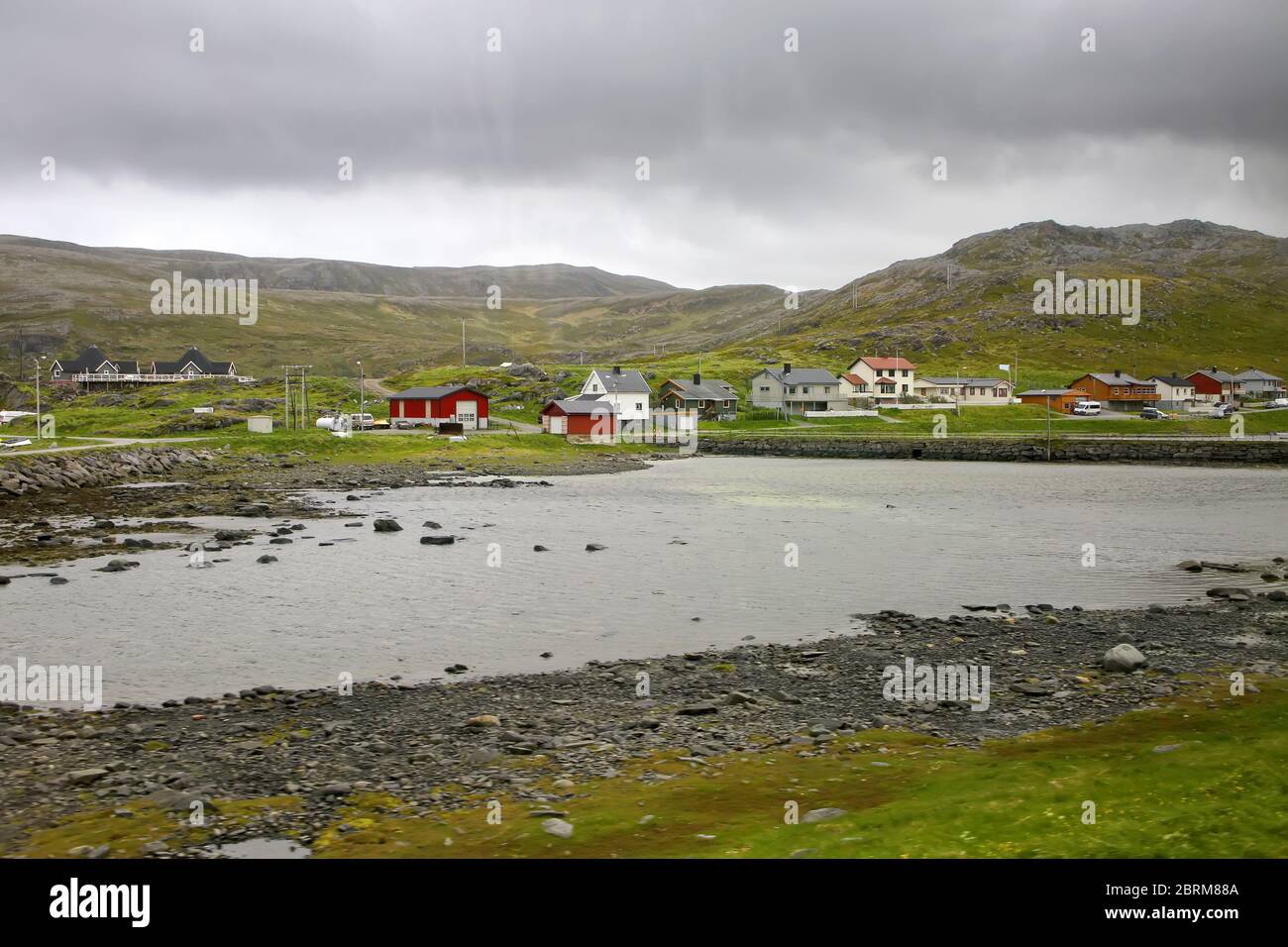 Skarsvag is a village in Nordkapp Municipality in Troms og Finnmark county, Norway. The village is on the northern coast of the island of Mageroya. Stock Photo
