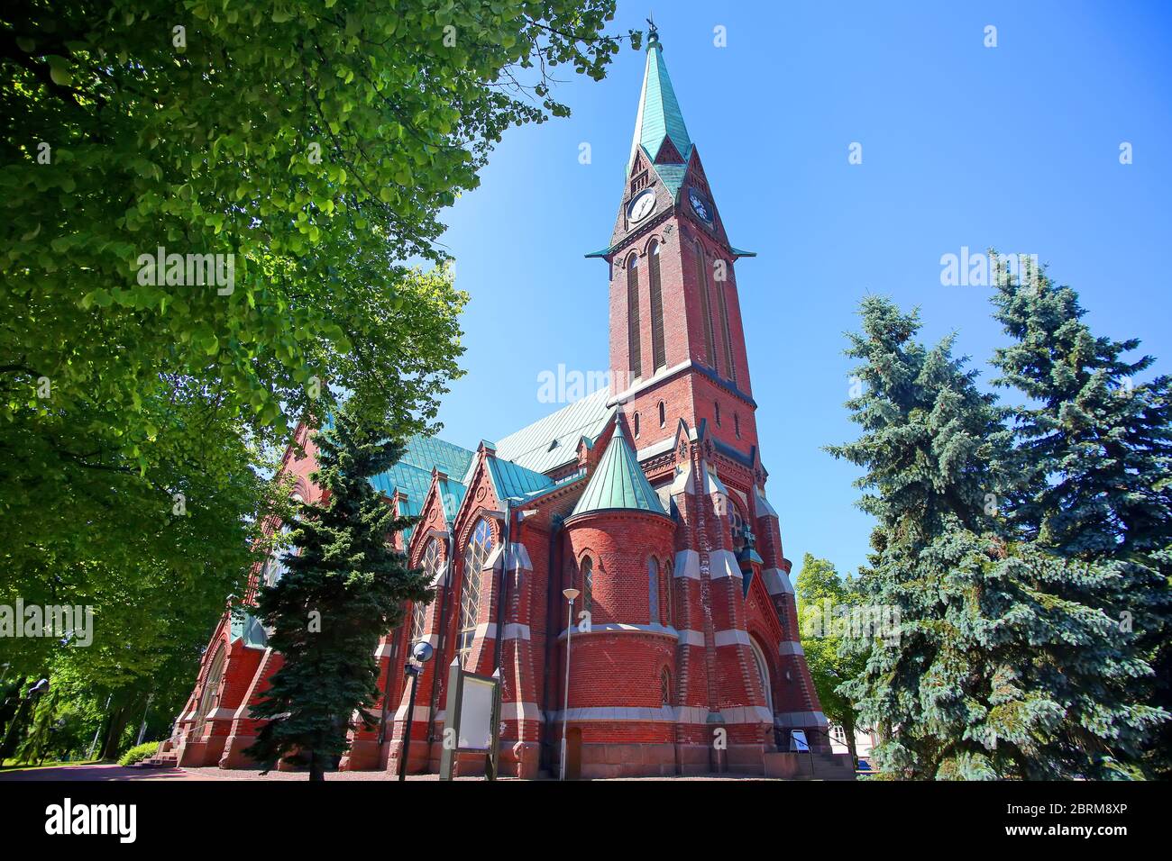 Kotka Church which was inaugurated in 1898. The Neo-Gothic church with its towers is an unusual red brick building in the Kotka cityscape, Finland. Stock Photo