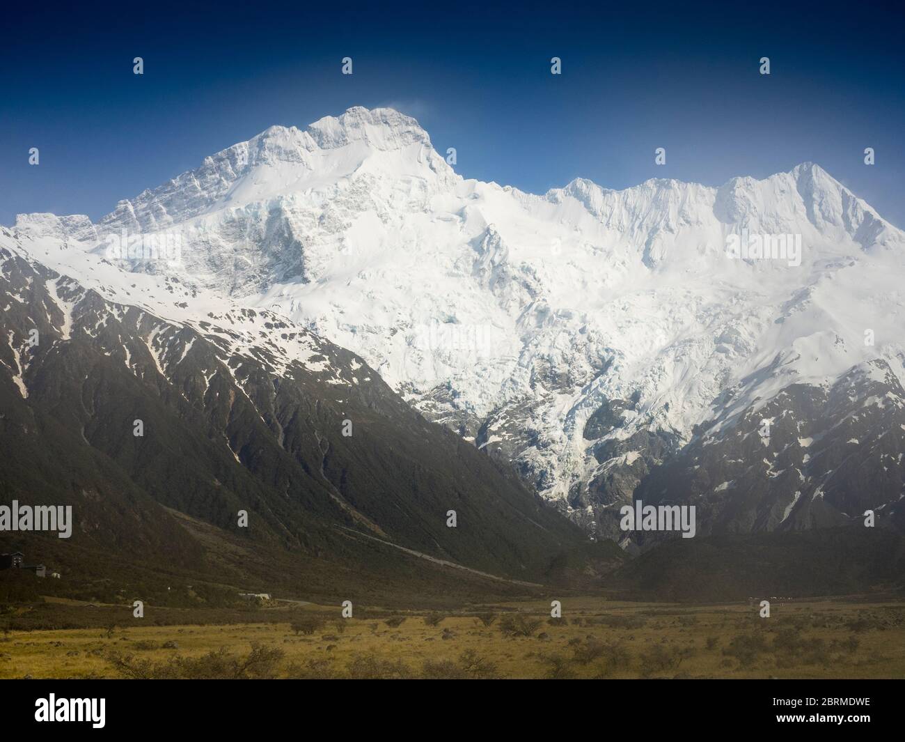 Mt Sefton dominates the view of Mt Cook Village, Aoraki/Mt Cook National Park, South Island, New Zealand Stock Photo