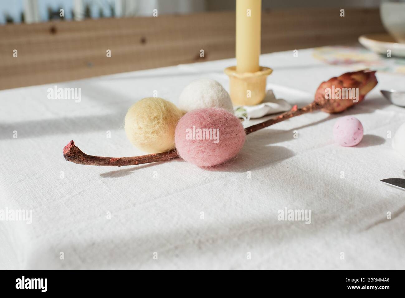 easter egg table decorations for a meal at home in spring Stock Photo