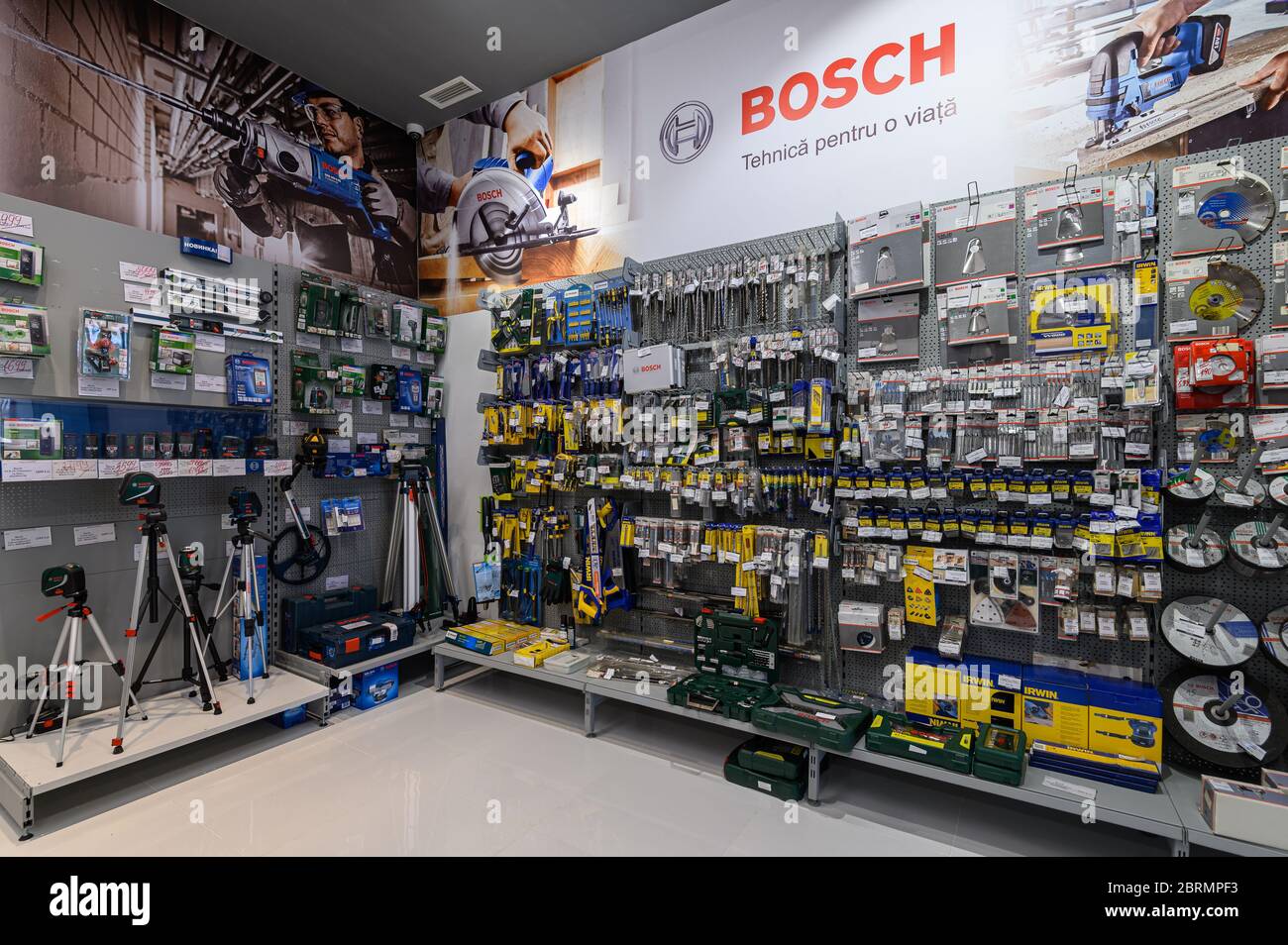 Shelves in a DIY shop with variety of power tools, mostly from the Bosch brand Stock Photo