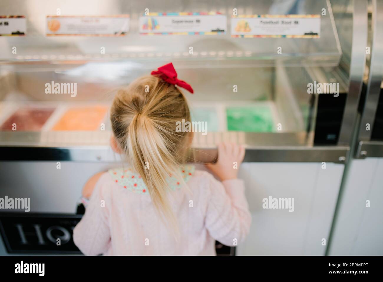 Girl looking for ice cream Stock Photo Alamy