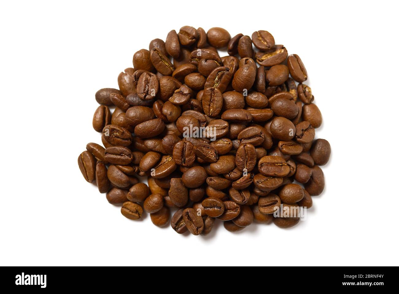 Pile of roasted coffee beans isolated in white background Stock Photo ...