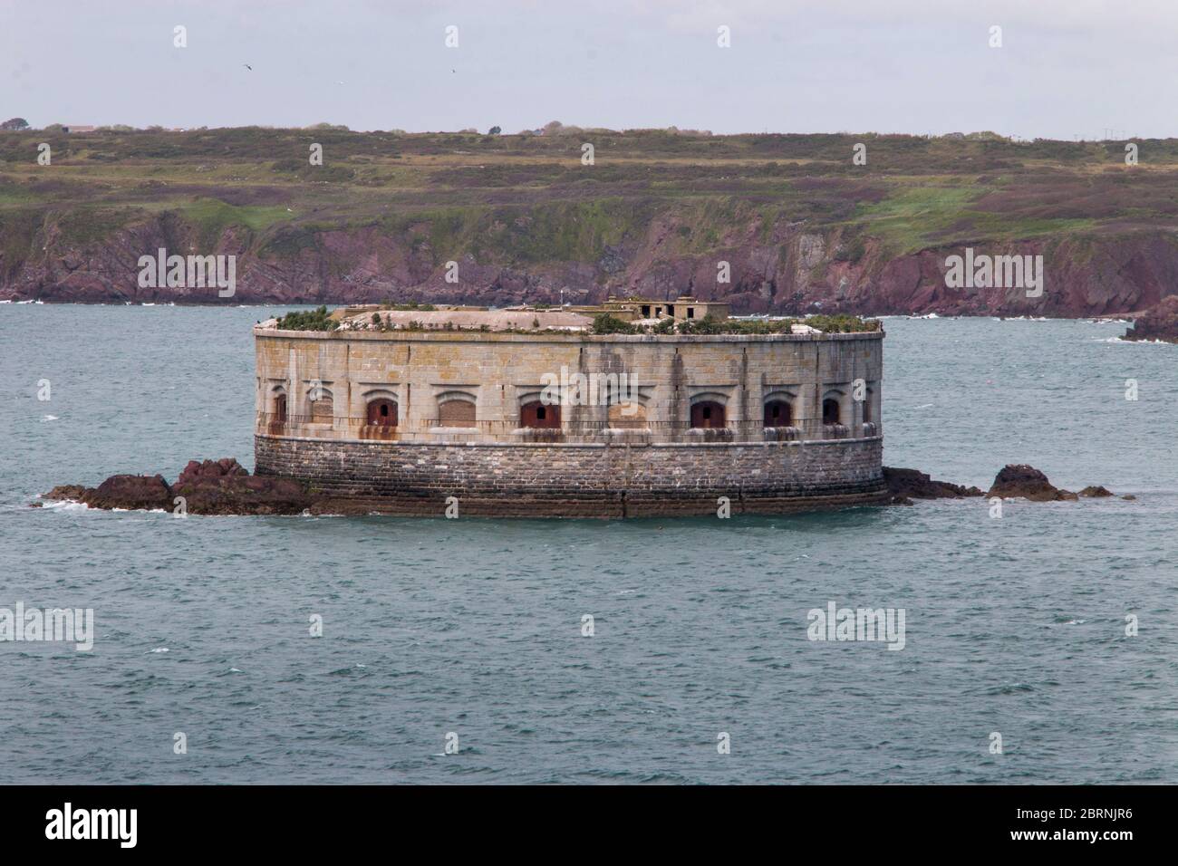 Stack Rock Fort, Milford Haven Waterway on gun deck near Herbrandston, Pembrokeshire, Wales, UK Stock Photo