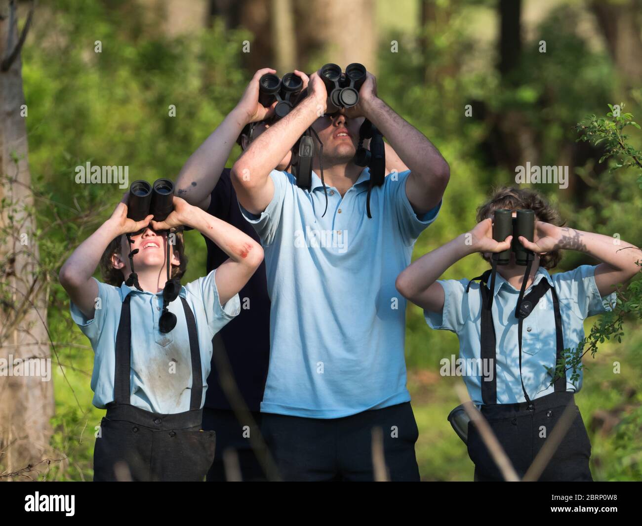 Amish kids birdwatching at the Wilderness Center in Stark County Ohio, USA Stock Photo