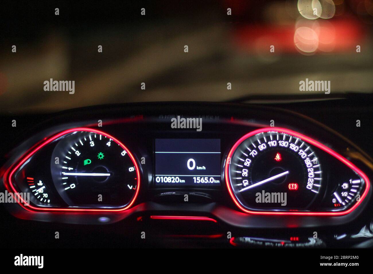 Front illuminated car panel at night, speed and dynamics Stock Photo