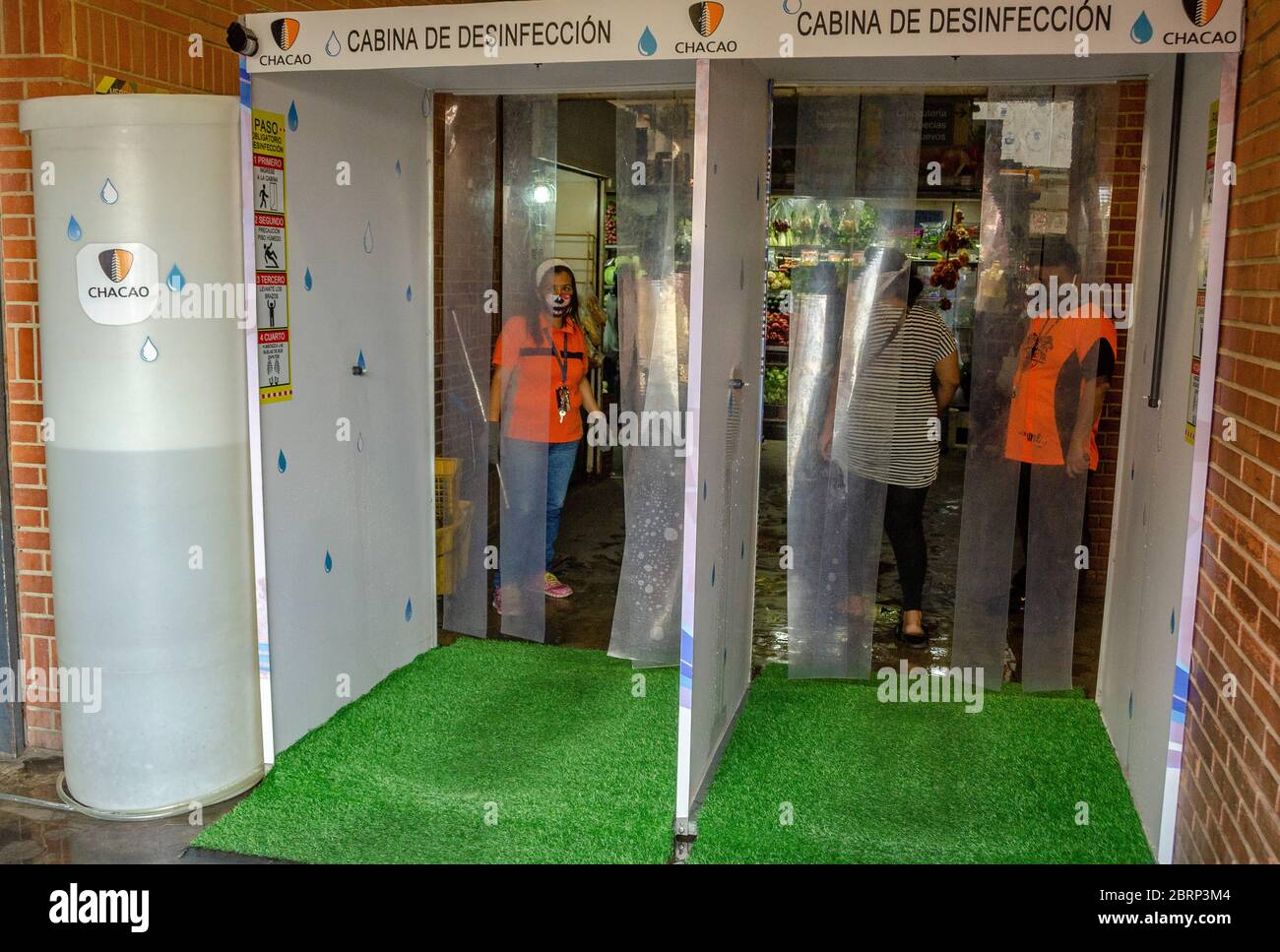 Disinfection booth at the Chacao Municipal Market, to prevent the spread and infection of Covid-19. Stock Photo