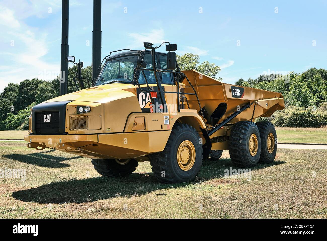 New CAT 725C2 articulated earth mover or hauler on display in front of a Caterpillar heavy equipment sales lot in Montgomery Alabama, USA. Stock Photo