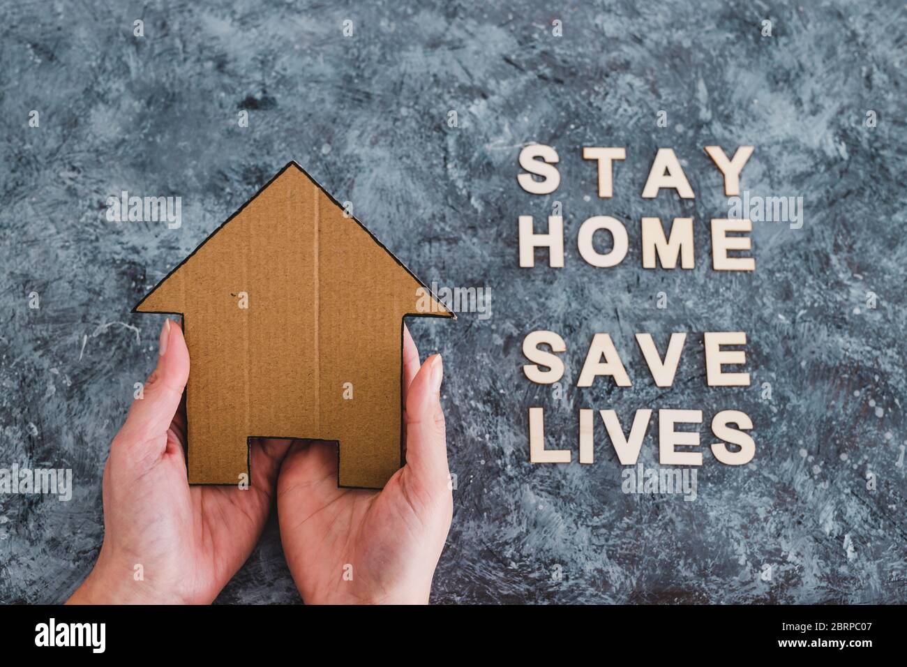 social distancing against covid-19 virus, Stay Home message with hand ...