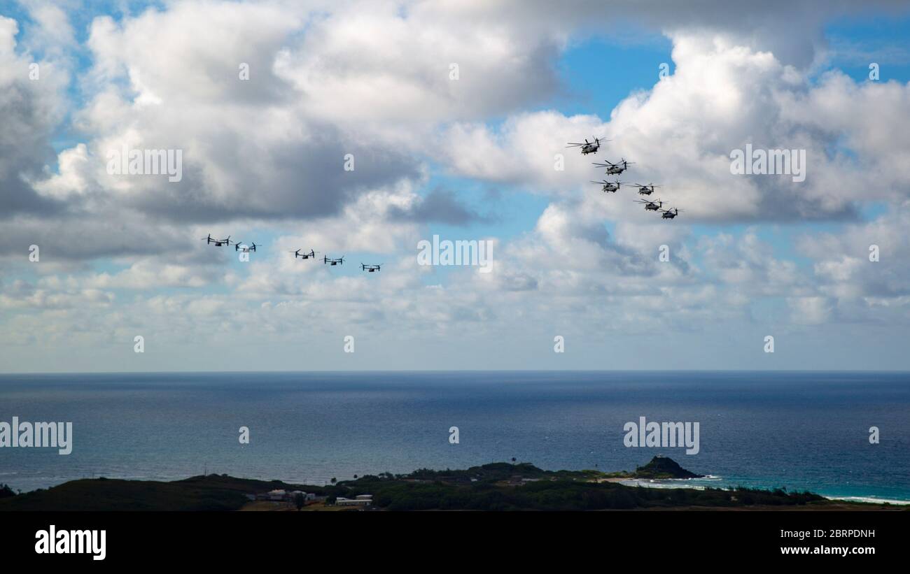 U.S. Marines with Marine Aircraft Group 24, conducted an integrated training mission along the shores of Oahu from Marine Corps Air Station Kaneohe Bay, Marine Corps Base Hawaii, May 19, 2020. Utilizing three separate flying platforms, MAG-24 successfully launched seven CH-53E Super Stallions, seven MV-22B Ospreys, and two UH-1Y Venoms while hitting critical training objectives to produce maximum readiness. (U.S. Marine Corps photo by Cpl. Eric Tso) Stock Photo