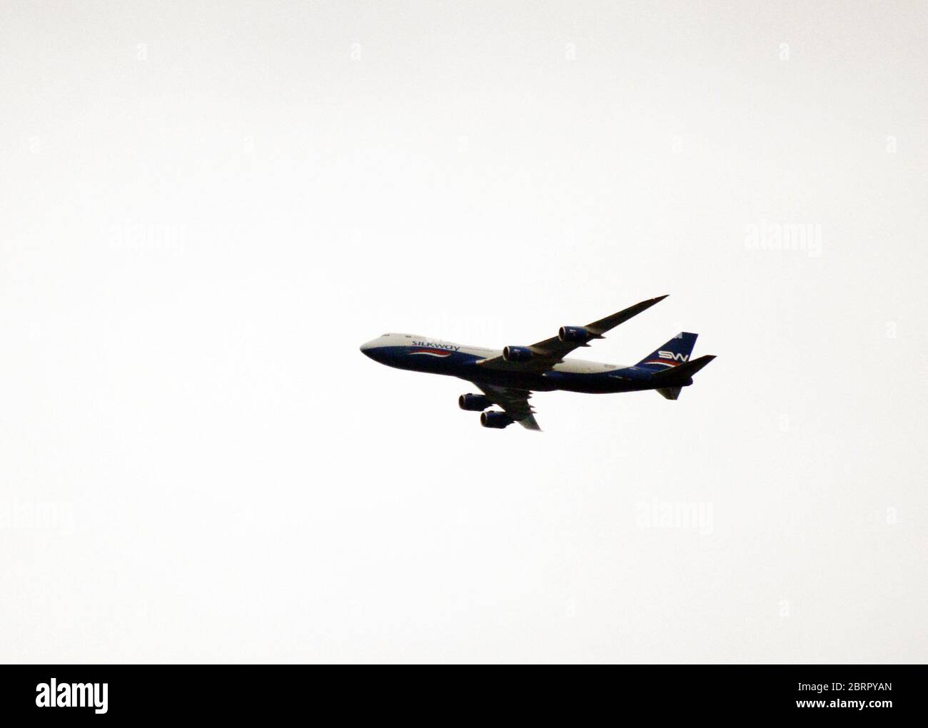 A Freight flight flying over Hong Kong. Stock Photo