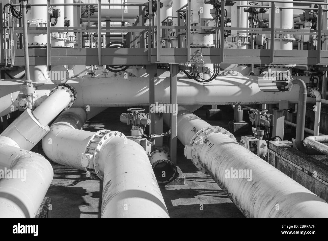 Pipeline and pipe rack of petroleum industrial plant. Offshore Industry oil and gas production