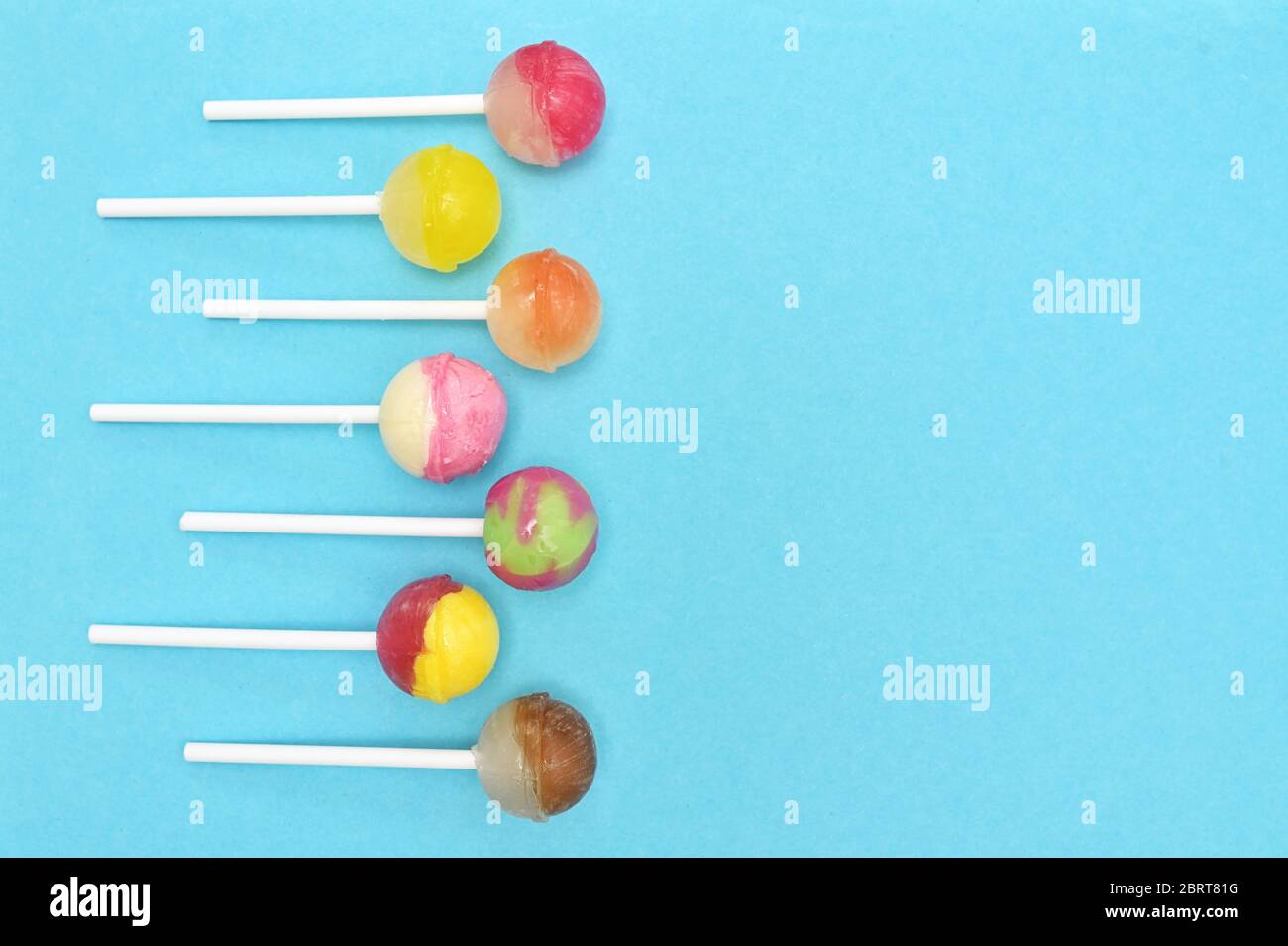 Abstract Colorful Lollipop Candy On Stick Stock Photo - Alamy