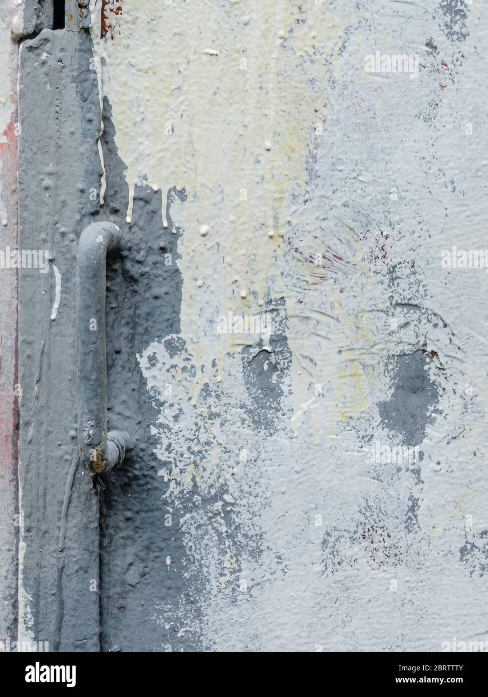 Fragment Of An Old Iron Door With A Handle Painted In Gray Paint Drips Of Dried Oil Paint On A Metal Surface Grunge Pattern Stock Photo Alamy