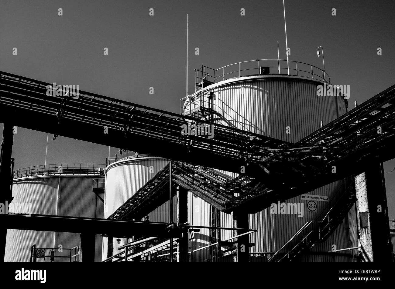 Crude oil tank in the oil refinery. Storage tanks for oil. Tanks for the storage of petroleum