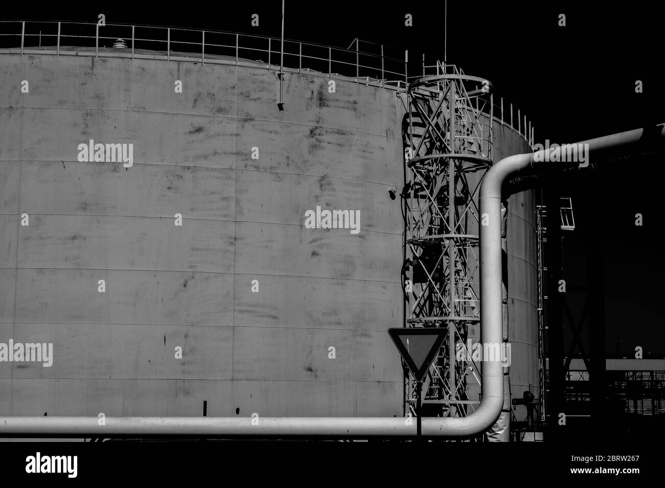 Crude oil tank in the oil refinery. Storage tanks for oil. Tanks for the storage of petroleum