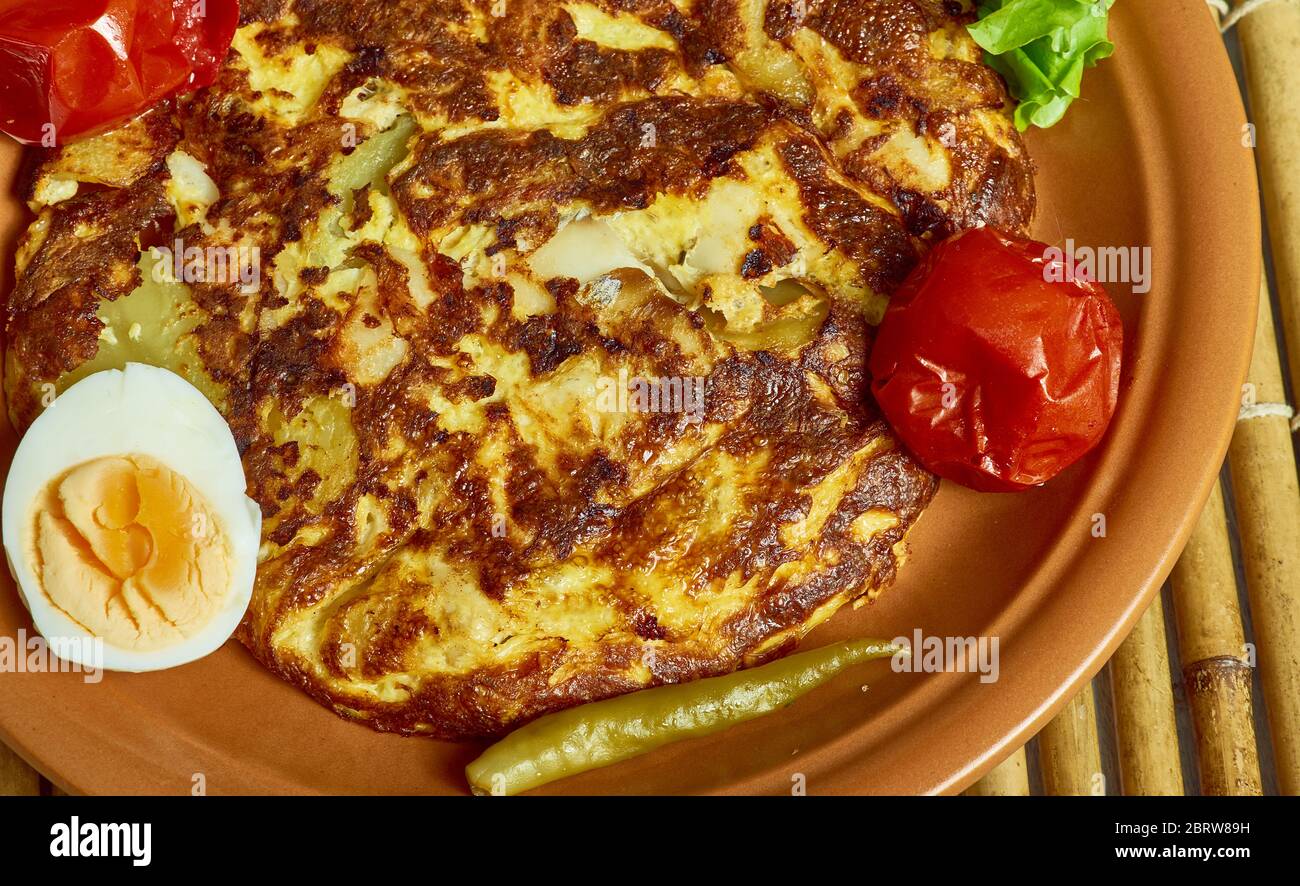 Salt cod tortilla omelet fish with potatoes Stock Photo Alamy