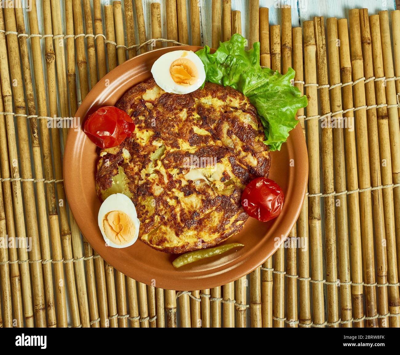 Salt cod tortilla omelet fish with potatoes Stock Photo Alamy