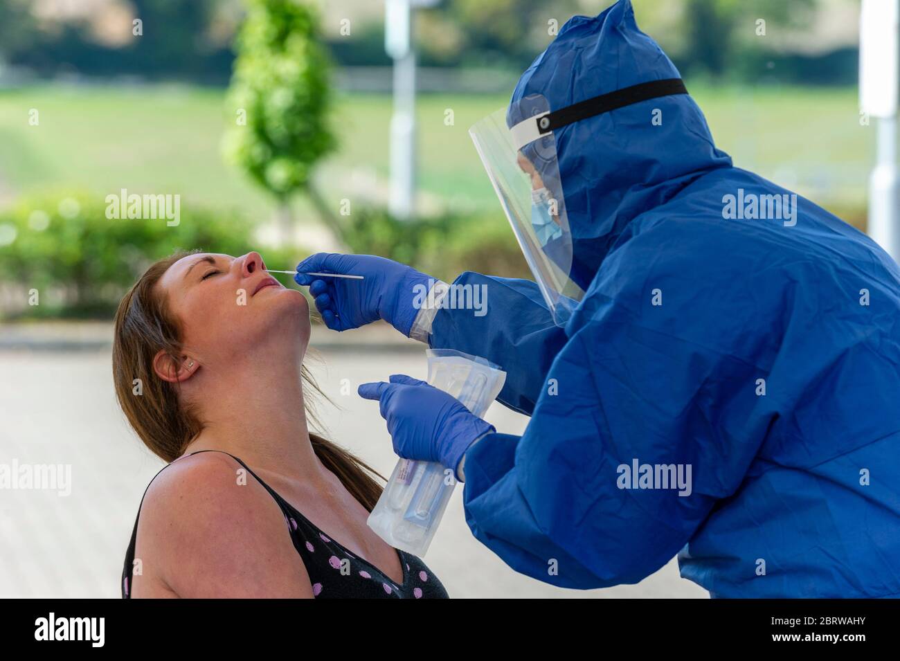 Femail being tested for Coronavirus Covid 19 in Norwich, Norfolk. Stock Photo