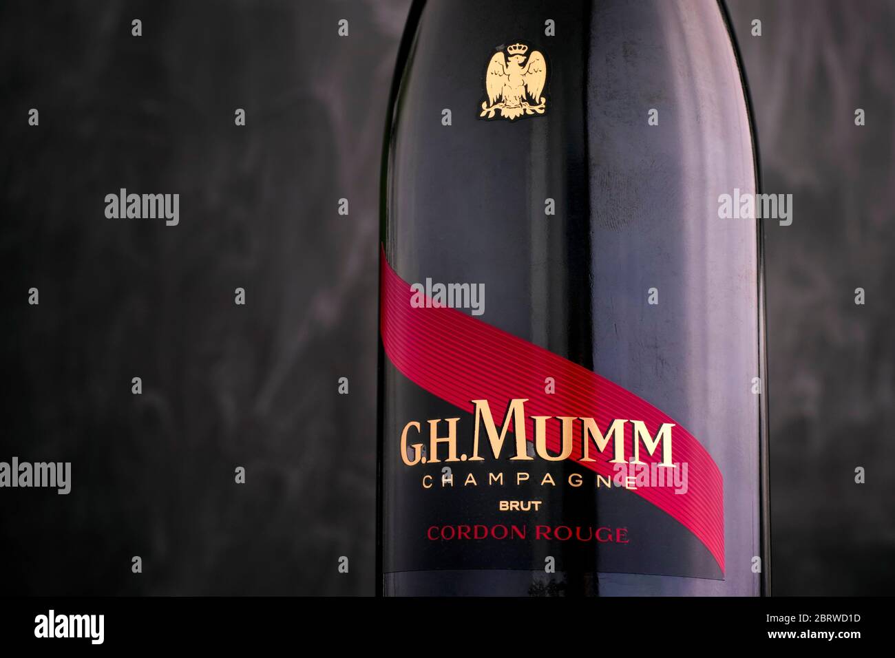 Tambov, Russian Federation - September 07, 2019 Close-up of Champagne G.H. Mumm bottle against black background. Stock Photo