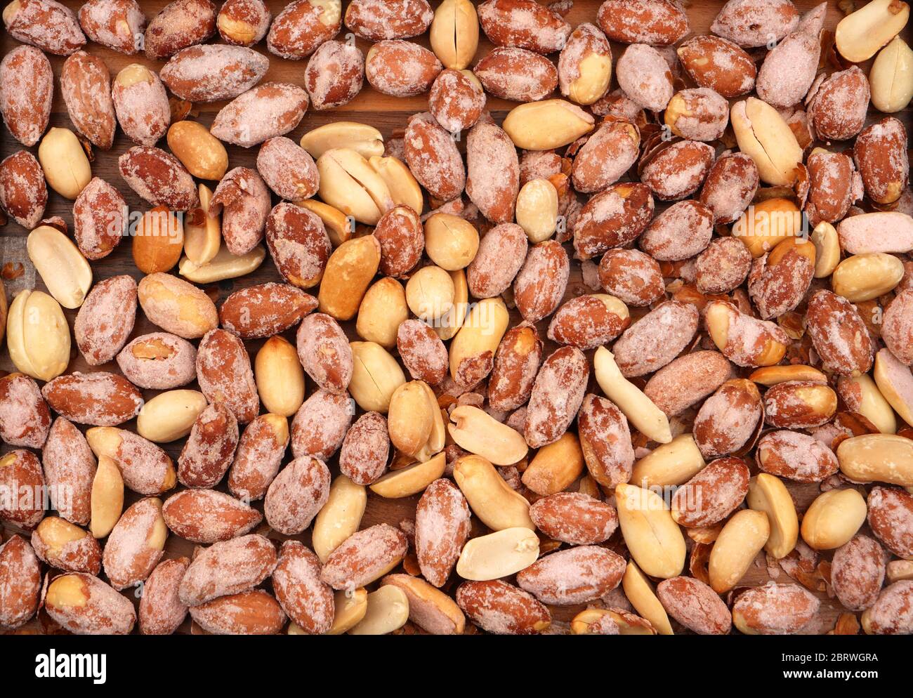 Organic salted peanuts. For texture or background. Stock Photo