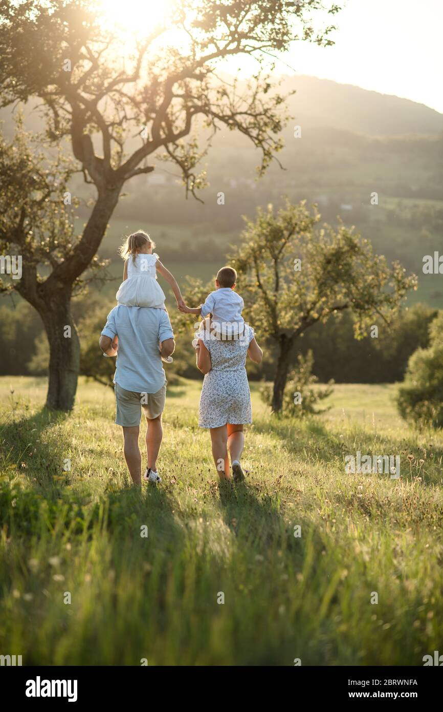 Woman with two children rear view hi-res stock photography and images ...