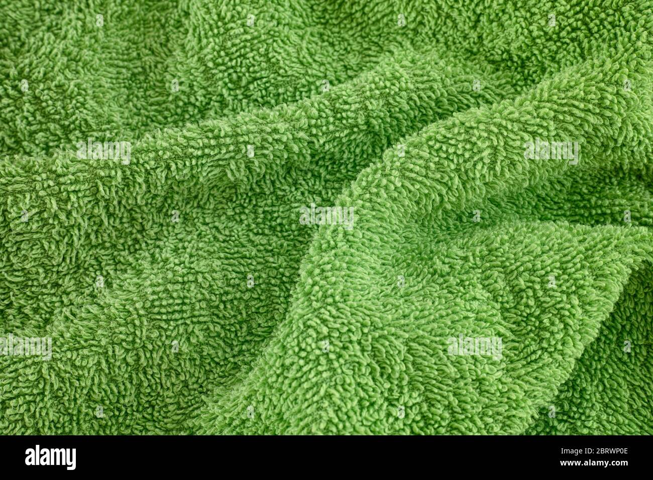 Green towel texture background. Close up. Stock Photo
