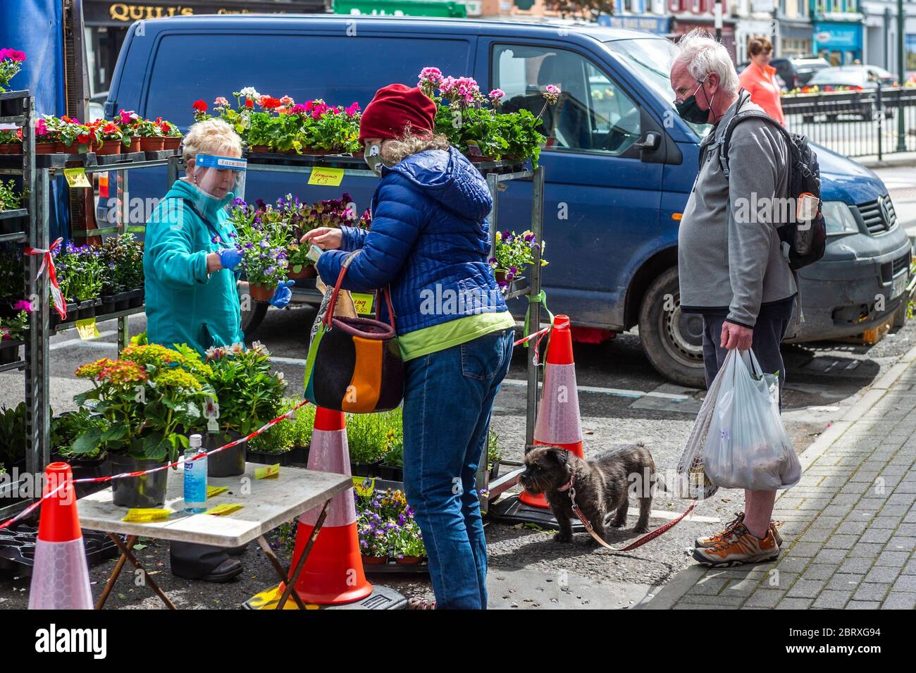 Bantry, West Cork, Ireland. 22nd May, 2020. Despite gale force winds, Bantry Market re-opened today with big crowds after a 2 month closure due to the Covid-19 pandemic. Credit: AG News/Alamy Live News Stock Photo
