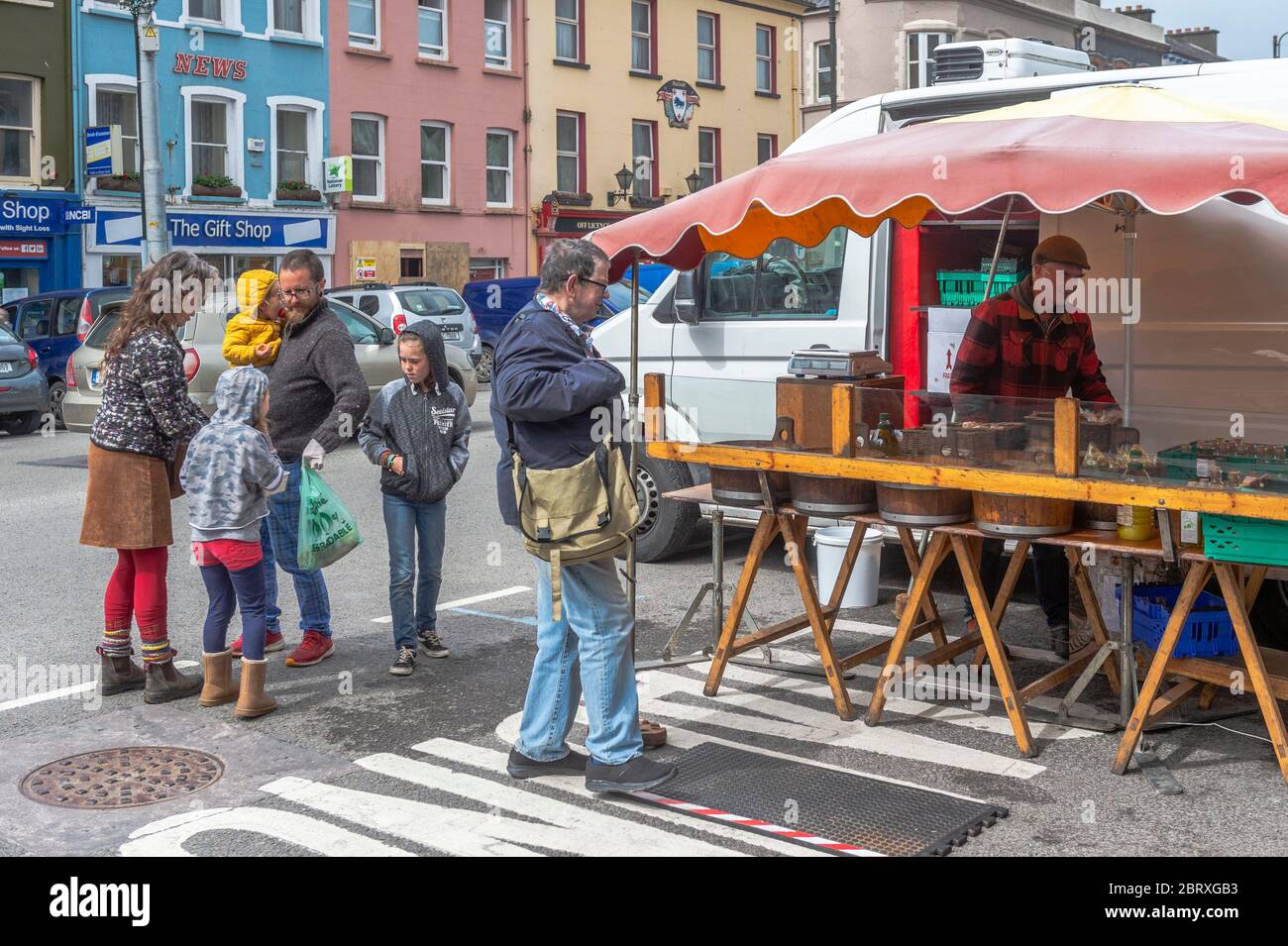 Bantry, West Cork, Ireland. 22nd May, 2020. Despite gale force winds, Bantry Market re-opened today with big crowds after a 2 month closure due to the Covid-19 pandemic. Credit: AG News/Alamy Live News Stock Photo