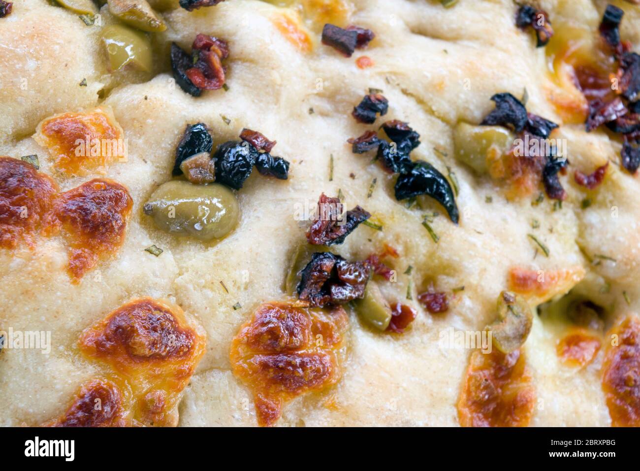 Freshly baked homemade Italian focaccia bread, a flat ovenbaked