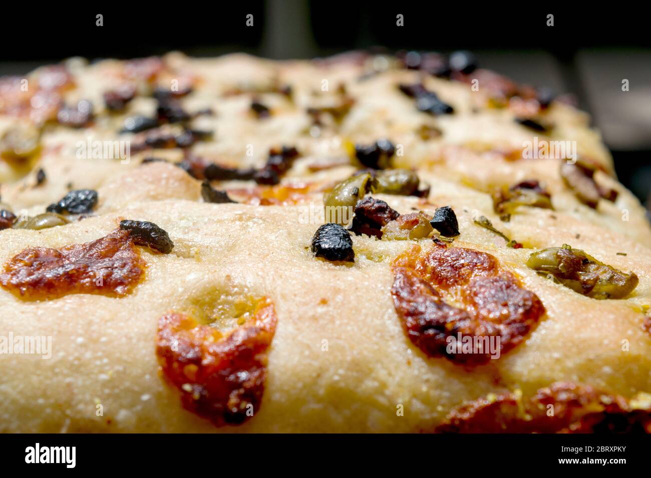 Freshly baked homemade Italian focaccia bread, a flat ovenbaked