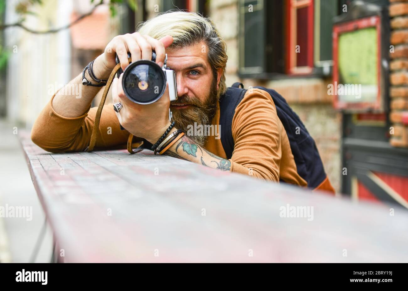 look at me. man photographer do shooting session. Shooting day hobby