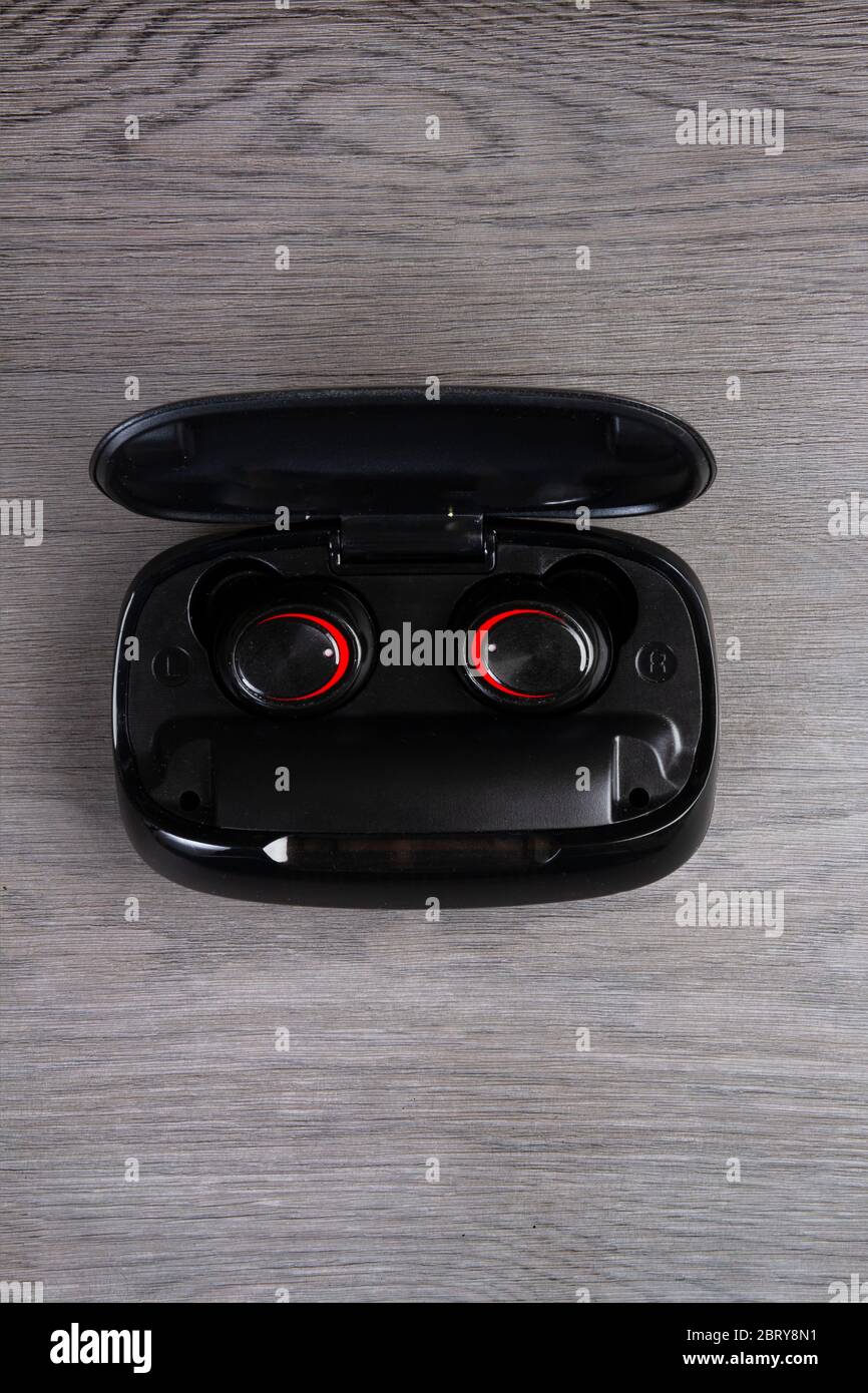 Bluetooth earbuds in a case Stock Photo
