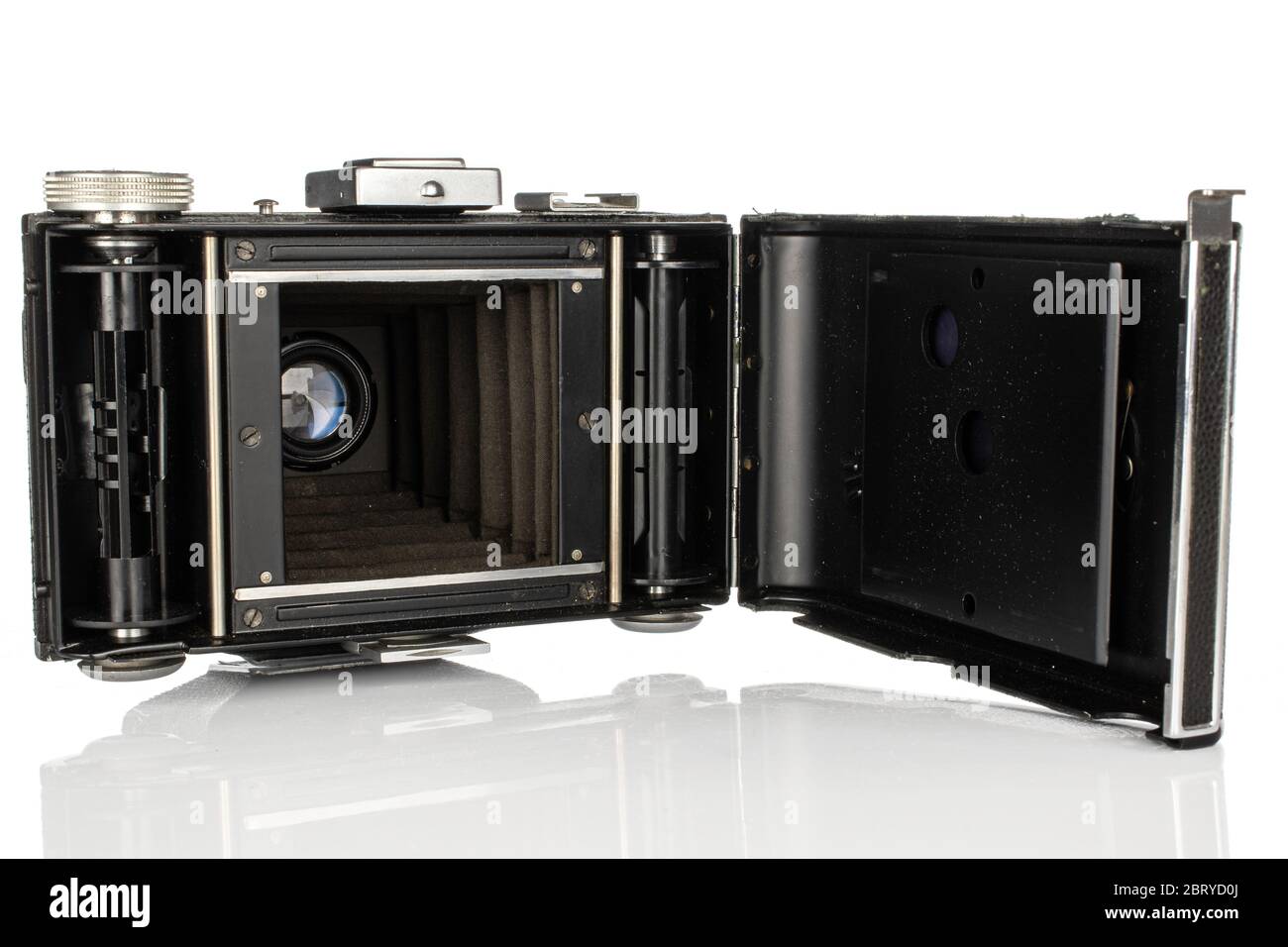 One whole opened vintage camera isolated on white background Stock ...