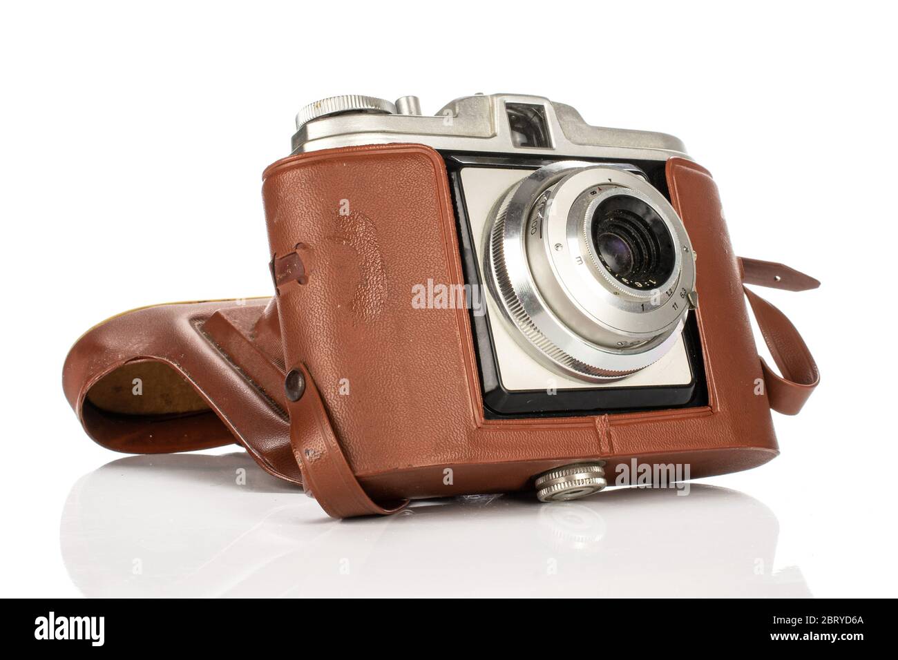 One whole vintage camera in case isolated on white background Stock ...